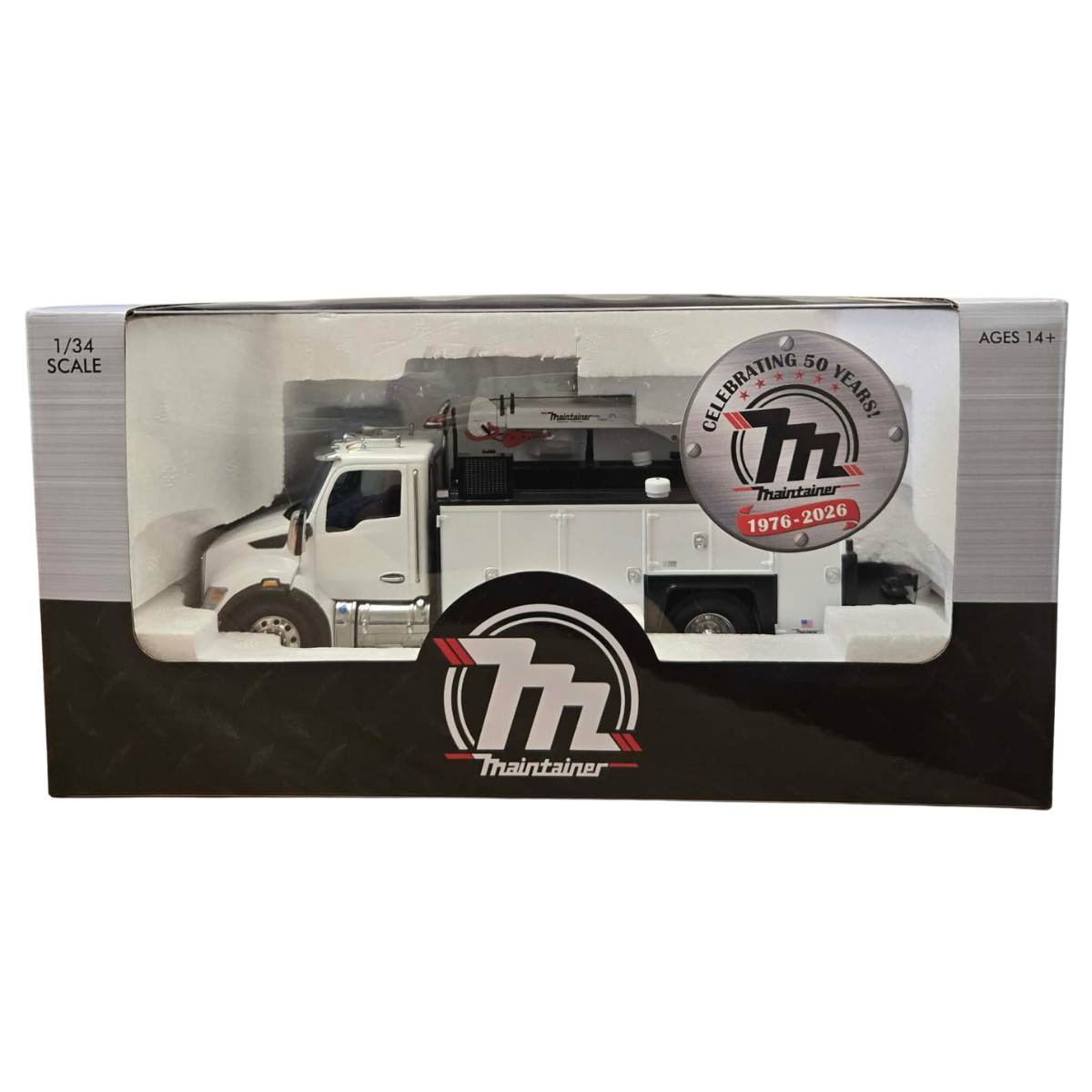 Model truck in packaging with 'Maintainer' branding and 50th anniversary logo.
