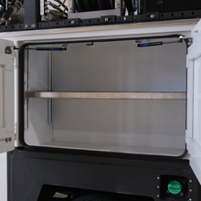 Load image into Gallery viewer, Open service body compartment with hansen international gas spring installation